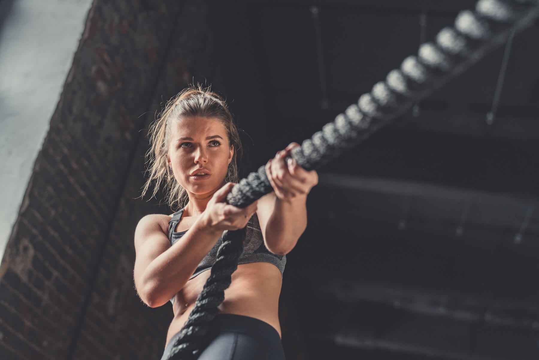 woman-pulling-fitness-rope